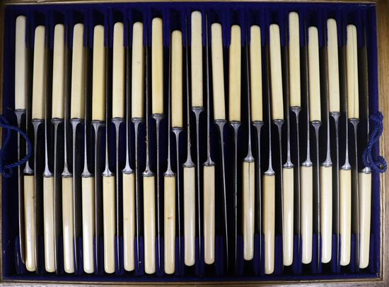 A Victorian cased part canteen of cutlery, including 34 bone handled table knives